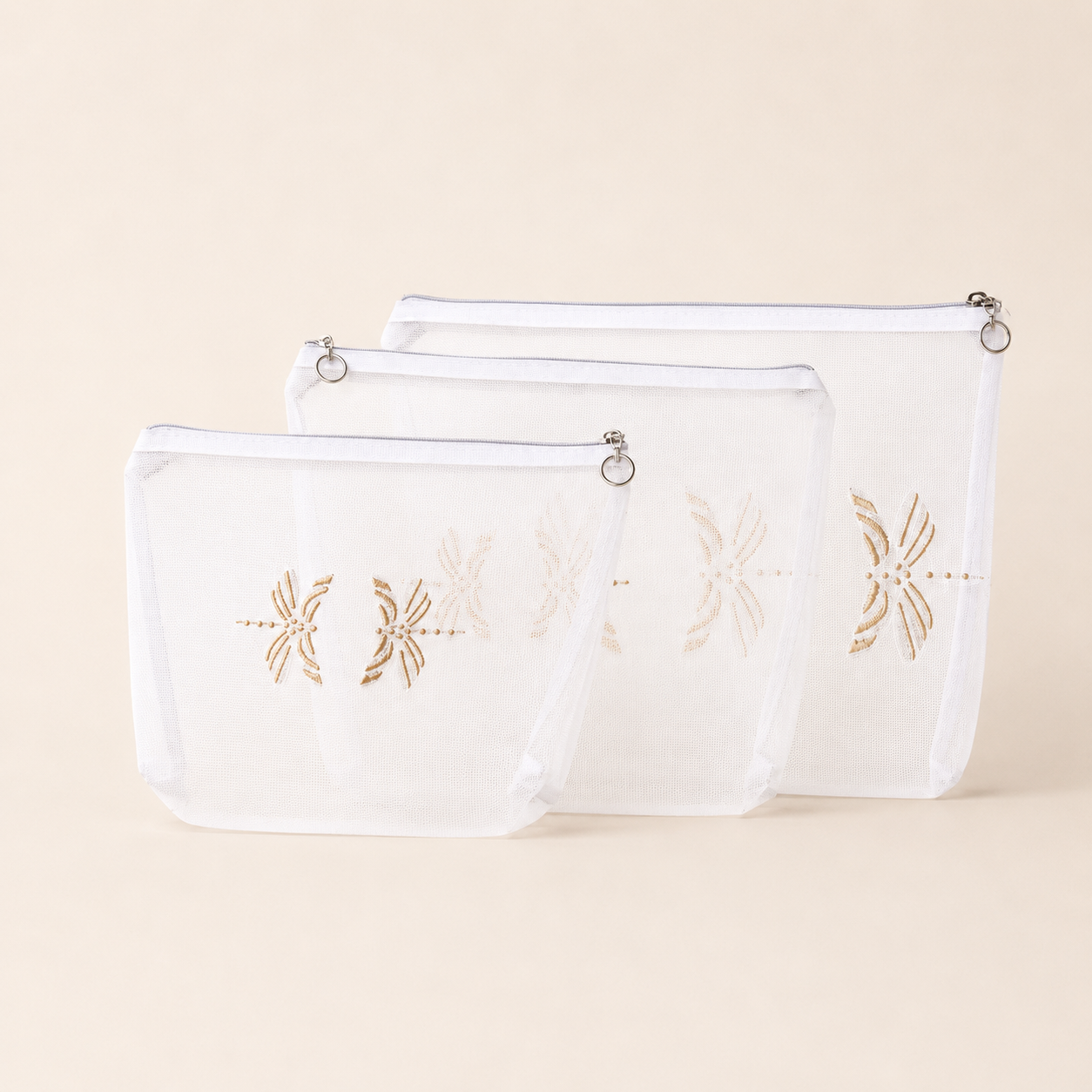 SET X 3 COSMETIQUERAS LIBÉLULA DORADA ENCONTRADA