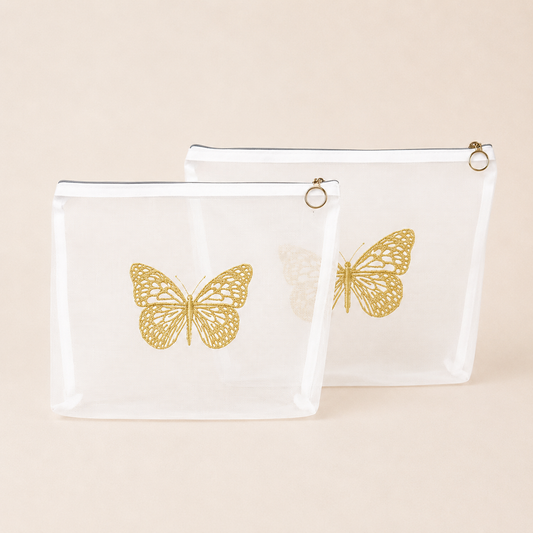 SET X 2 COSMETIQUERAS MARIPOSA DORADA
