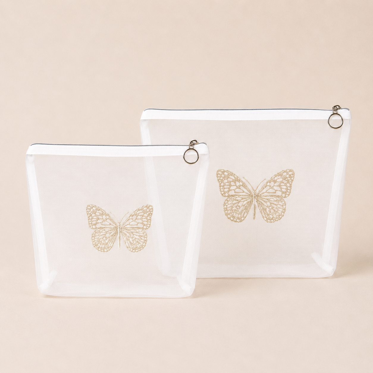 SET X 2 COSMETIQUERAS MARIPOSA PLATA