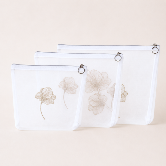 SET X 3 COSMETIQUERAS ORQUÍDEA PLATEADA