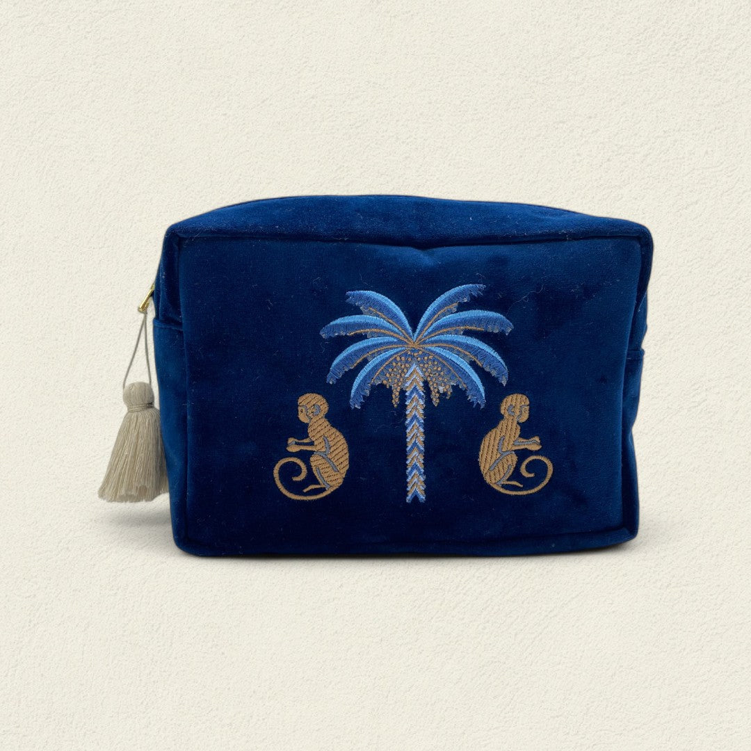 MONO ENTRE PALMAS AZULES