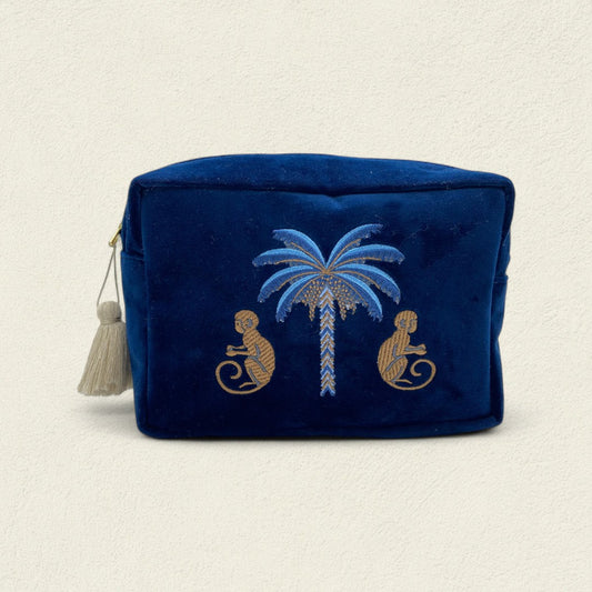 MONO ENTRE PALMAS AZULES